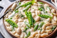 Spring Gnocchi with Crisp Sugar Snap Peas and Creamy Dill Sauce