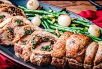 Pork Tenderloin Bursting with Spinach and Sun Dried Tomato Pesto