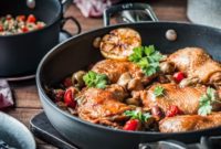 Tender Braised Chicken with Briny Olives, Tangy Artichokes, and Hearty Barley Pilaf