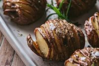 Crispy Hasselback Red Potatoes with Chive Butter
