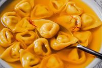 Coriander Ricotta Tortellini in Golden Saffron Infusion