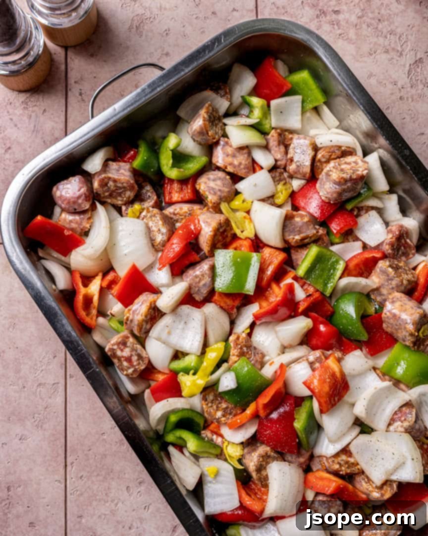 Effortless Oven-Roasted Italian Sausage and Peppers 3 Italian Sausage and Peppers Step 2: Add all ingredients to a large roasting pan.
