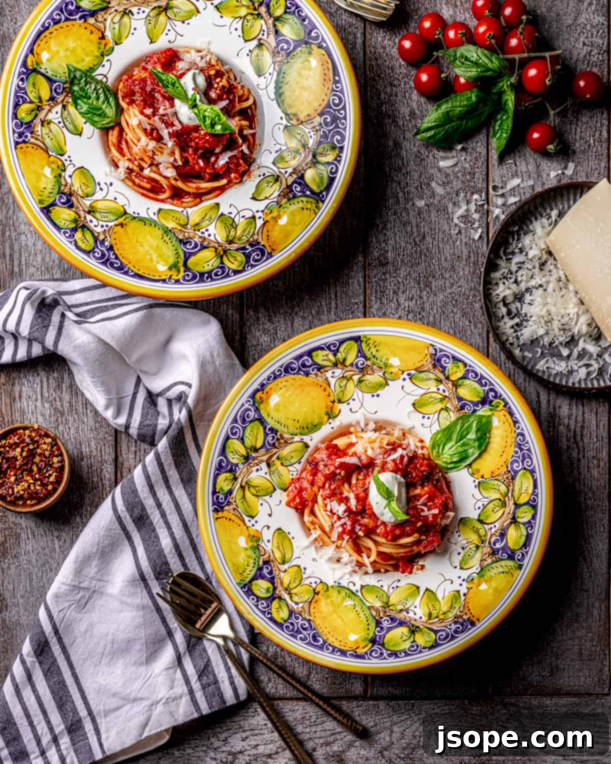 Vibrant Pomodoro Pasta with Whipped Basil Ricotta 3 Fresh ingredients laid out for making Pasta al Sugo di Pomodoro with Whipped Basil Ricotta, including San Marzano tomatoes, fresh basil, and ricotta cheese.