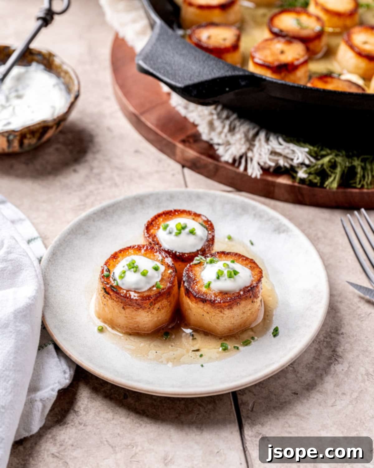 Garlic Rosemary Fondant Potatoes with Creme Fraiche served with a main course