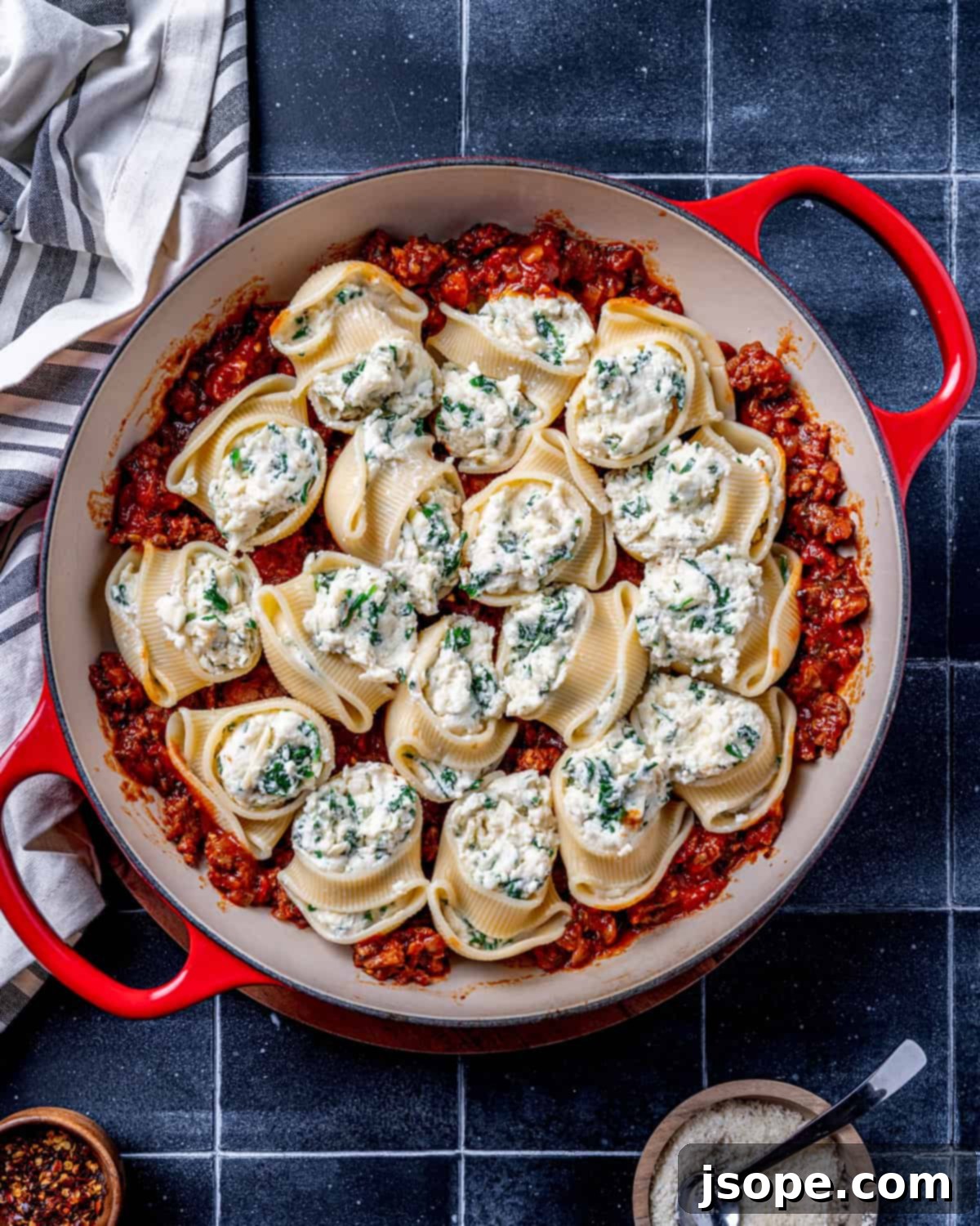 Three Cheese Stuffed Shells with Spicy Sausage Sauce
