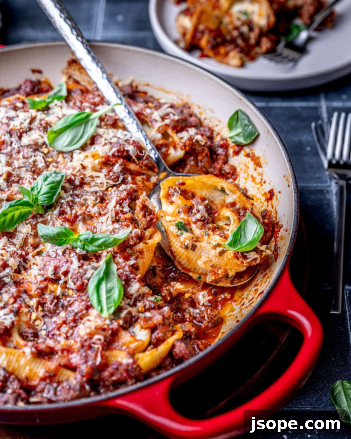 Three Cheese Stuffed Shells with Spicy Sausage Sauce
