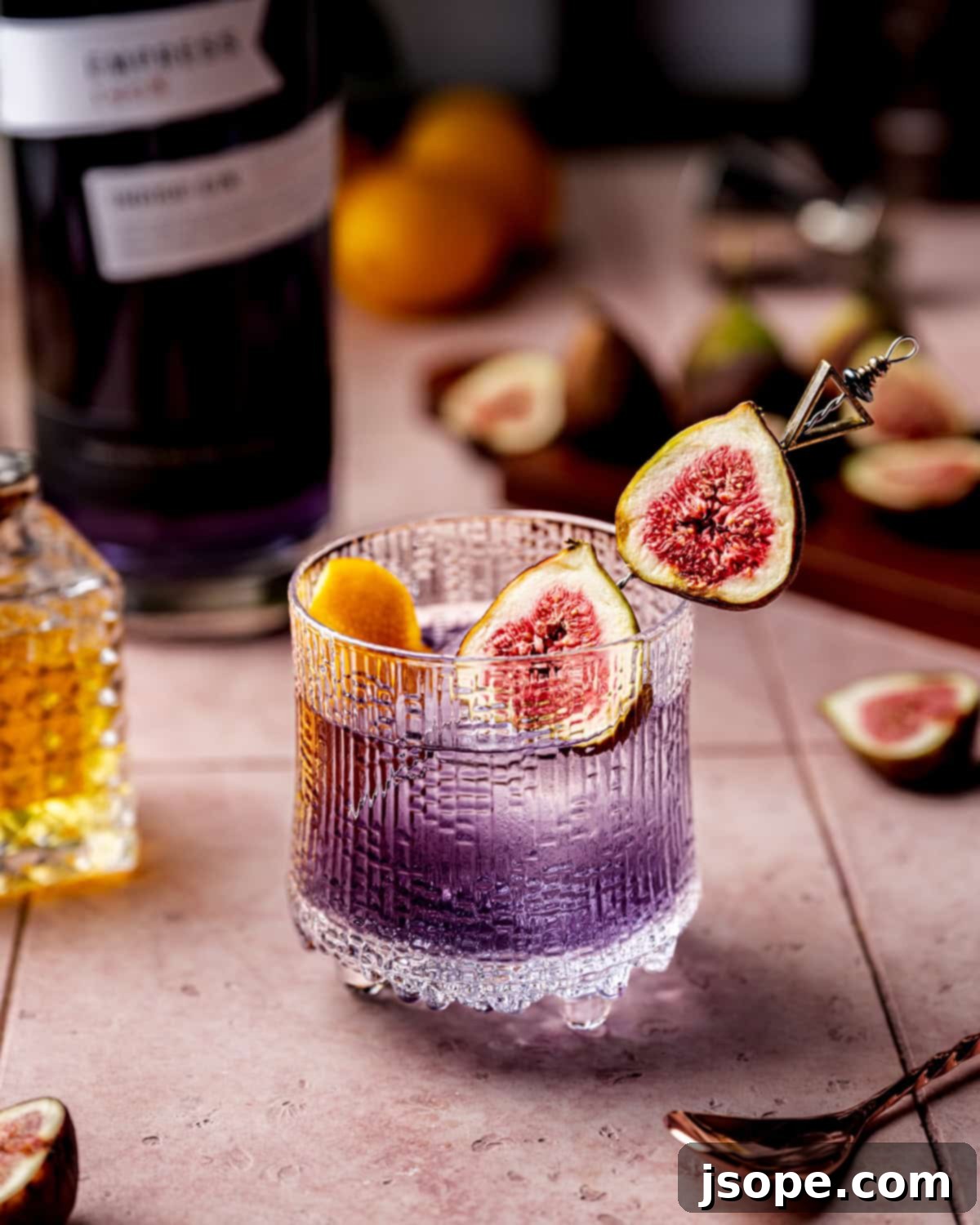 Aromatic Fig Cardamom Gin Old Fashioned with a lemon twist