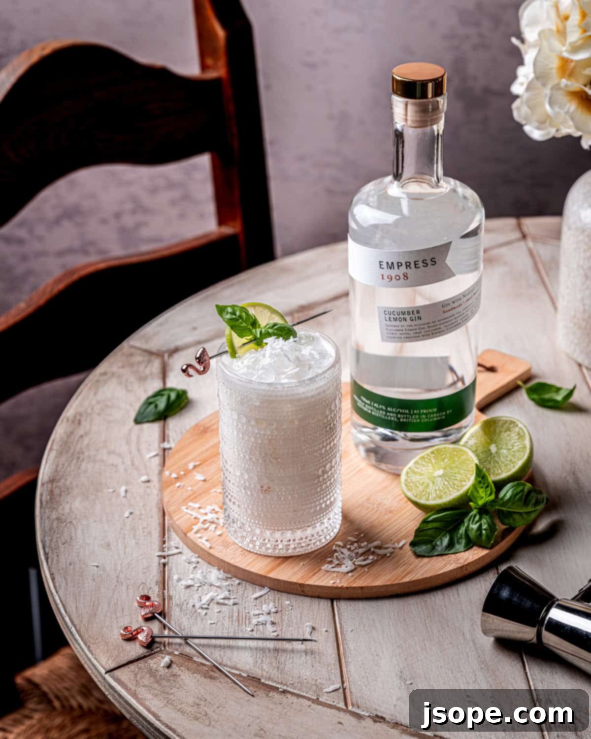 Tropical Coconut Basil Lime Gin Cocktail with fresh basil garnish