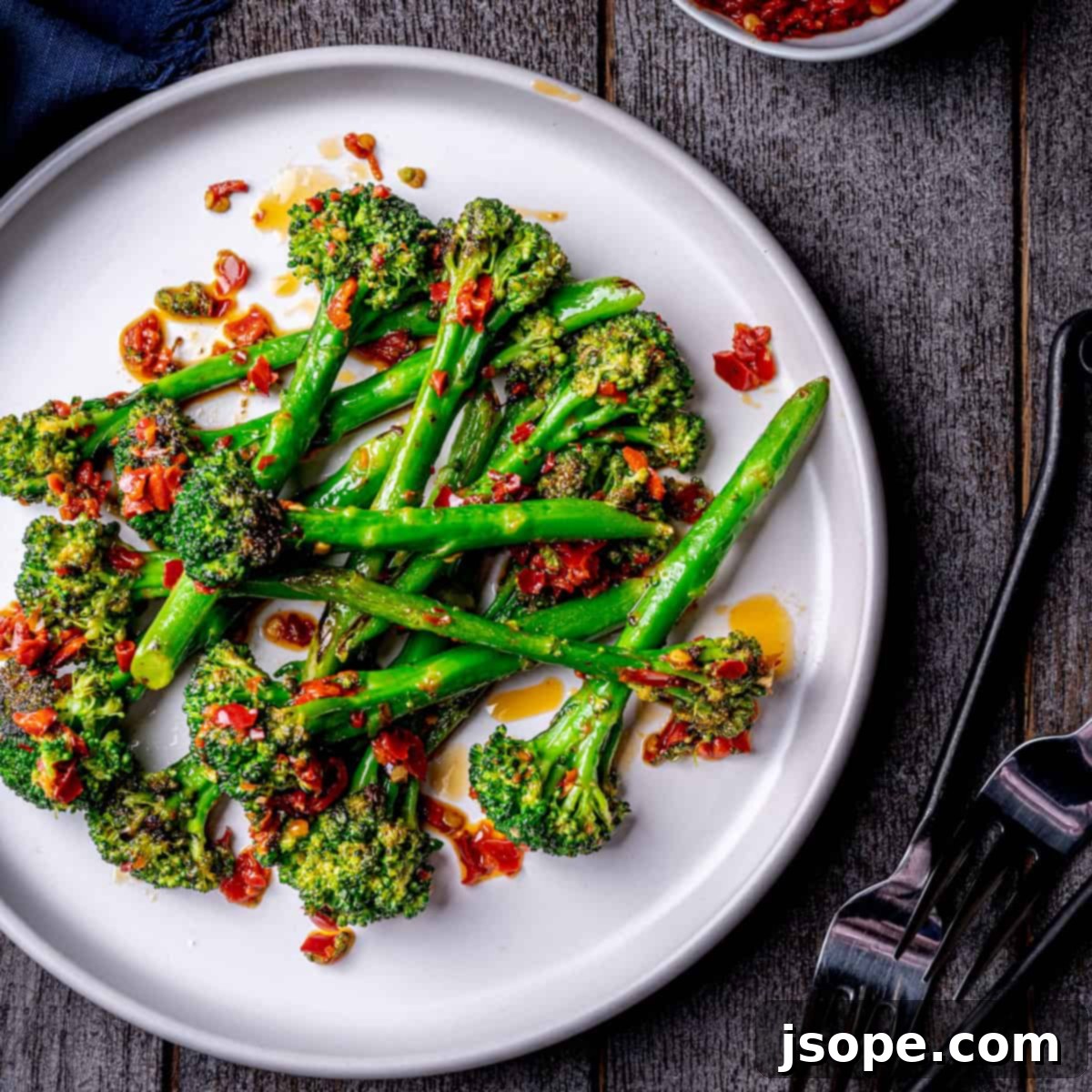 Spicy Charred Calabrian Chili Broccolini - a vibrant, quick, and easy side dish featuring tender broccolini pan-seared with spicy Calabrian chili paste and brightened with lemon zest. Perfect for any meal.