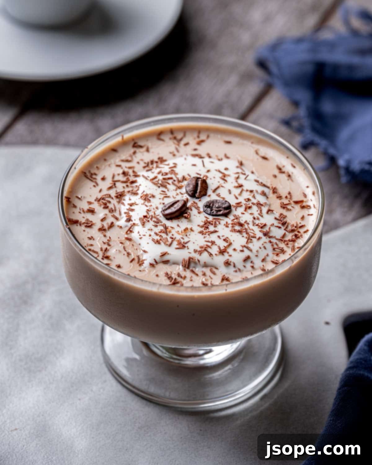 Coffee Panna Cotta with Chocolate Ganache topped with whipped cream