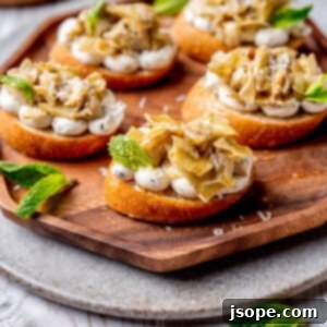 Marinated artichoke hearts crostini, a delightful appetizer.
