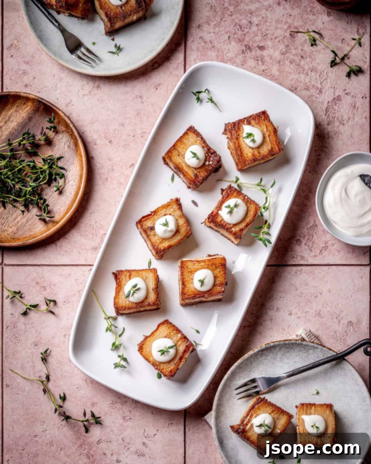 Crispy Garlic Parmesan Potato Pavé pieces stacked elegantly
