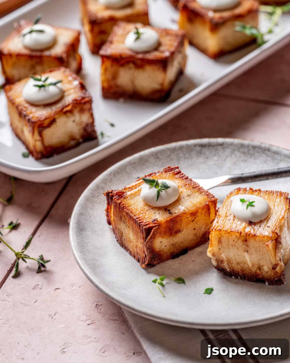 Delicately layered Parmesan Potato Pavé ready for baking