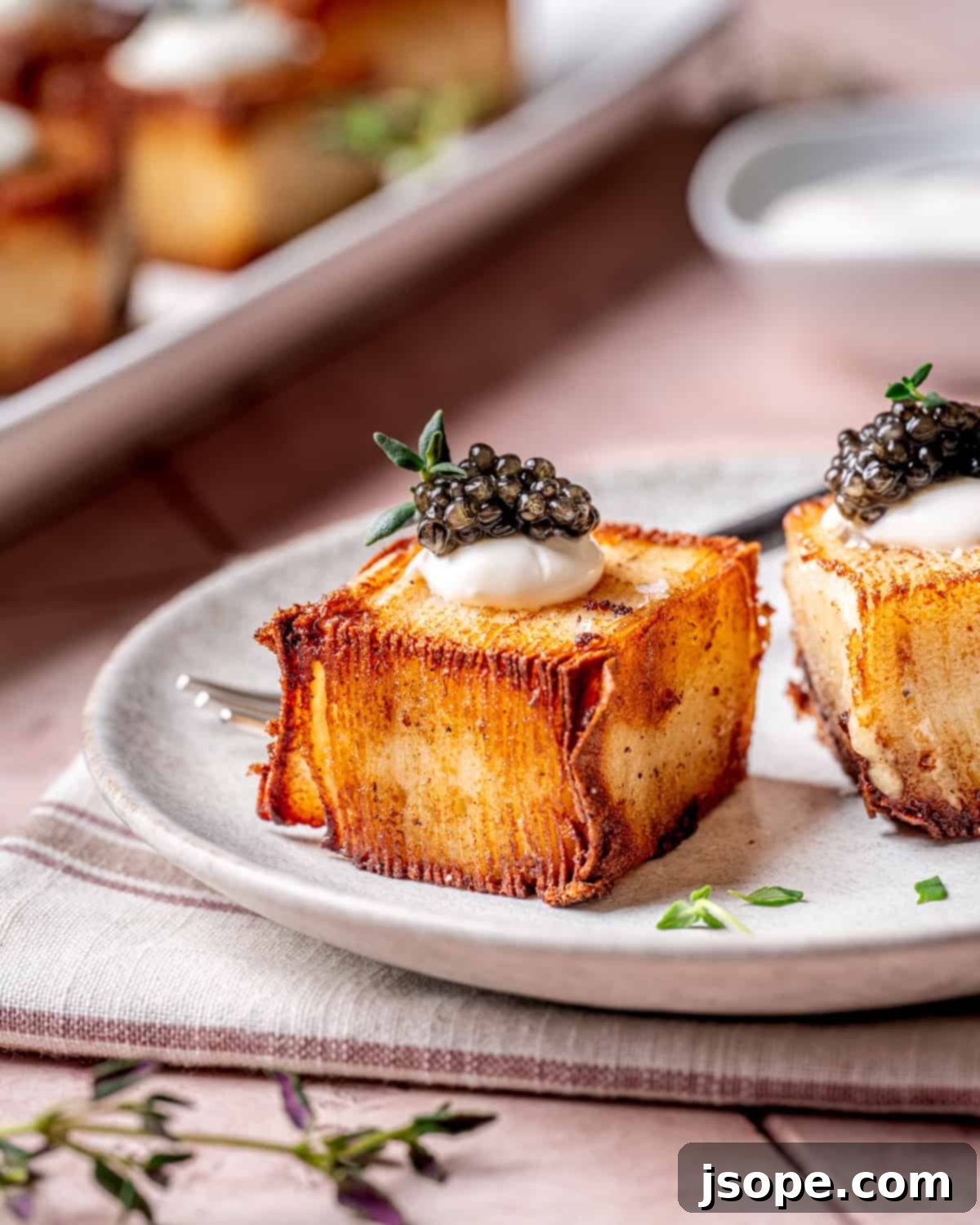 Luxury Potato Pavé garnished with a generous serving of caviar