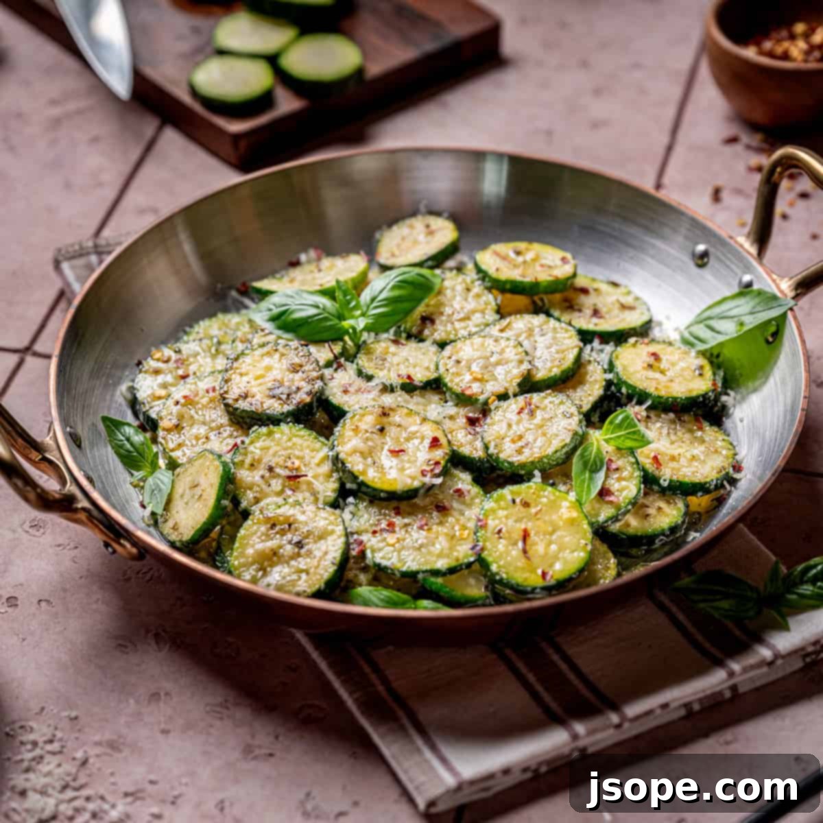 Italian Herb Sautéed Zucchini Squash Recipe - close up of cooked zucchini in pan
