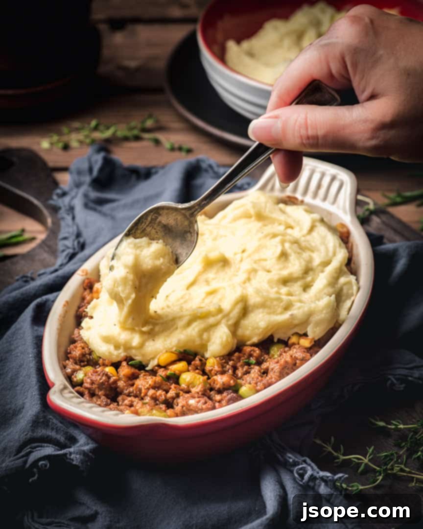 Shepherd's Pie assembly in a baking dish before baking