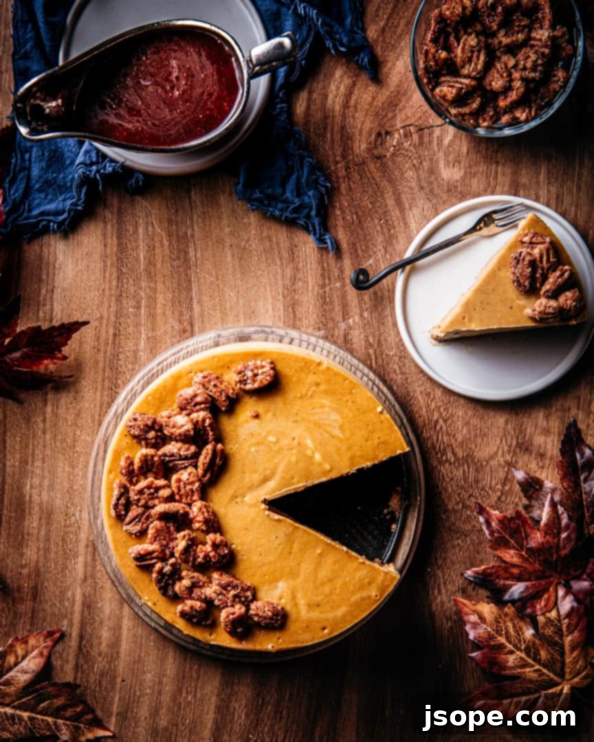 Spiced Pumpkin Mascarpone Cheesecake with Candied Cinnamon Pecans 3 Pumpkin Mascarpone Cheesecake sliced