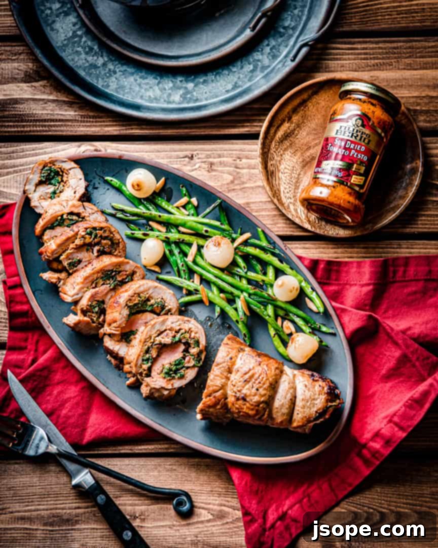 Spinach and Sun Dried Tomato Pesto Stuffed Pork Tenderloin