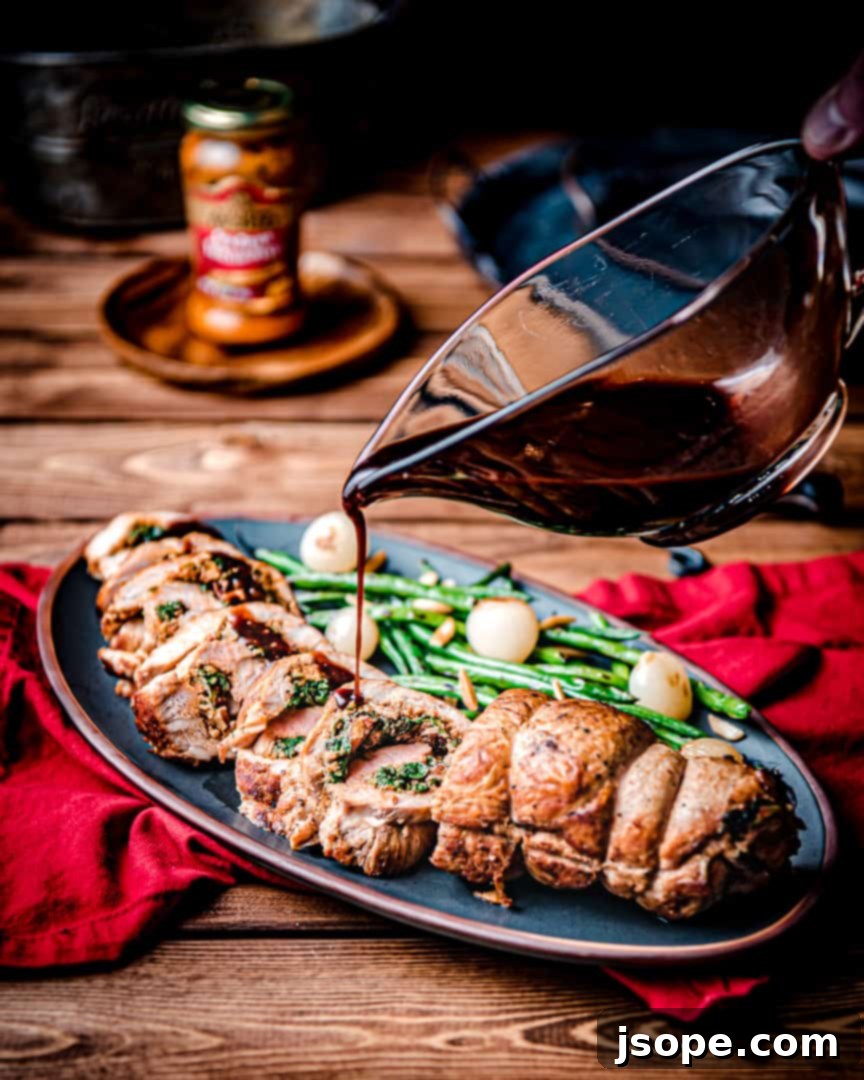 Spinach and Sun Dried Tomato Pesto Stuffed Pork Tenderloin, sliced