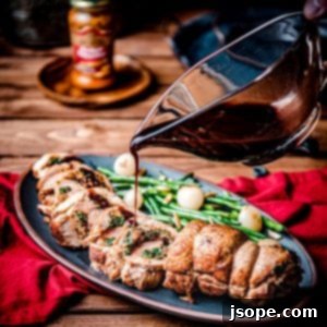 Spinach and Sun Dried Tomato Pesto Stuffed Pork Tenderloin