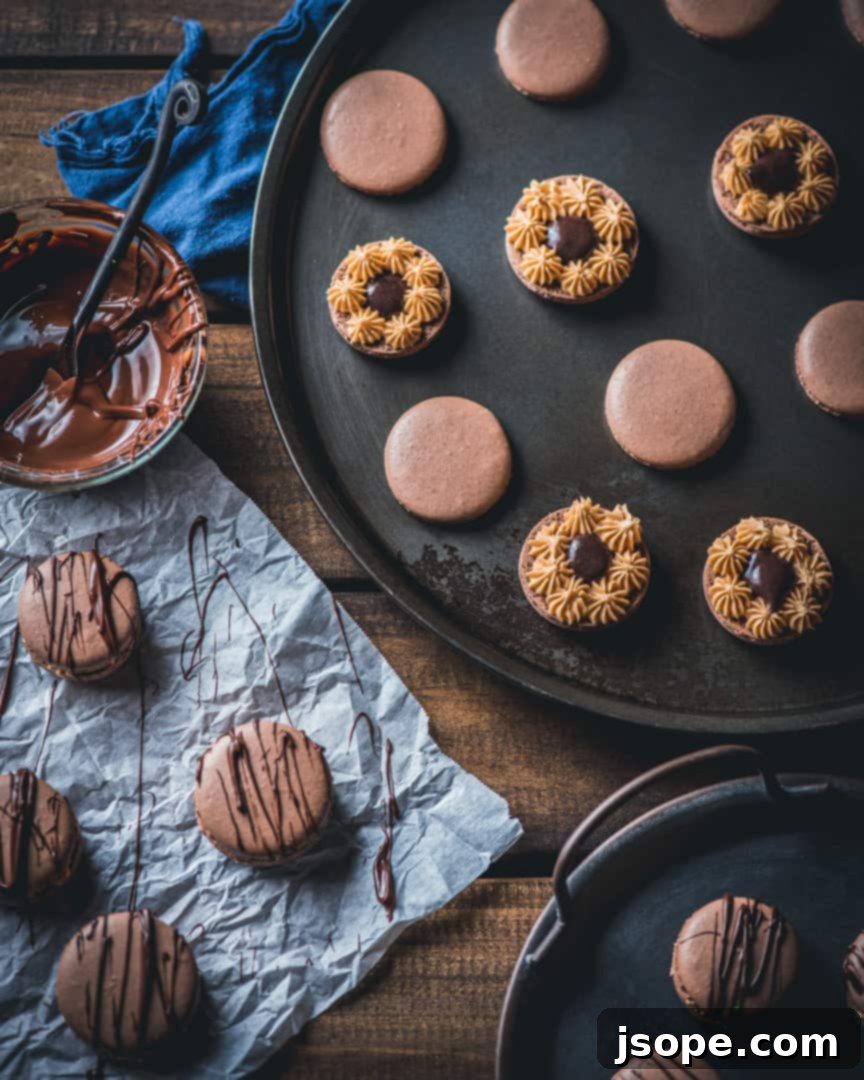 Chocolate Peanut Butter Cup Macarons filled with creamy goodness