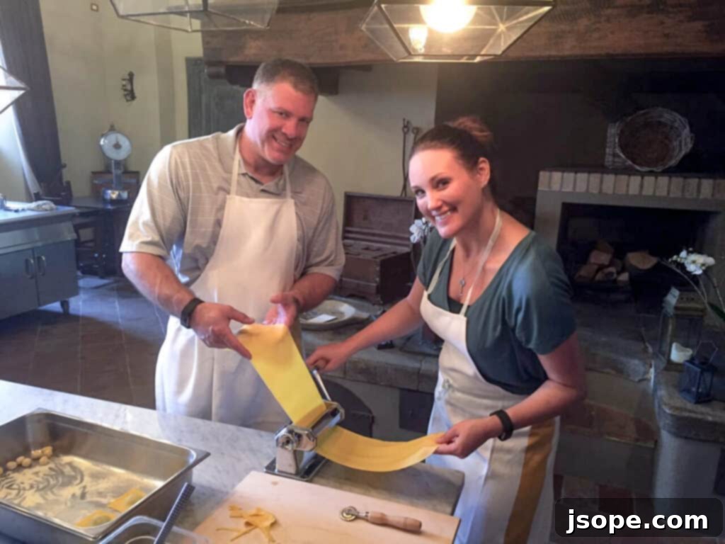 Uncorking Our Culinary Story 2 Angela and Mark with Chef Francesco in a cooking class at Castello di Casole, Tuscany, learning Italian culinary techniques