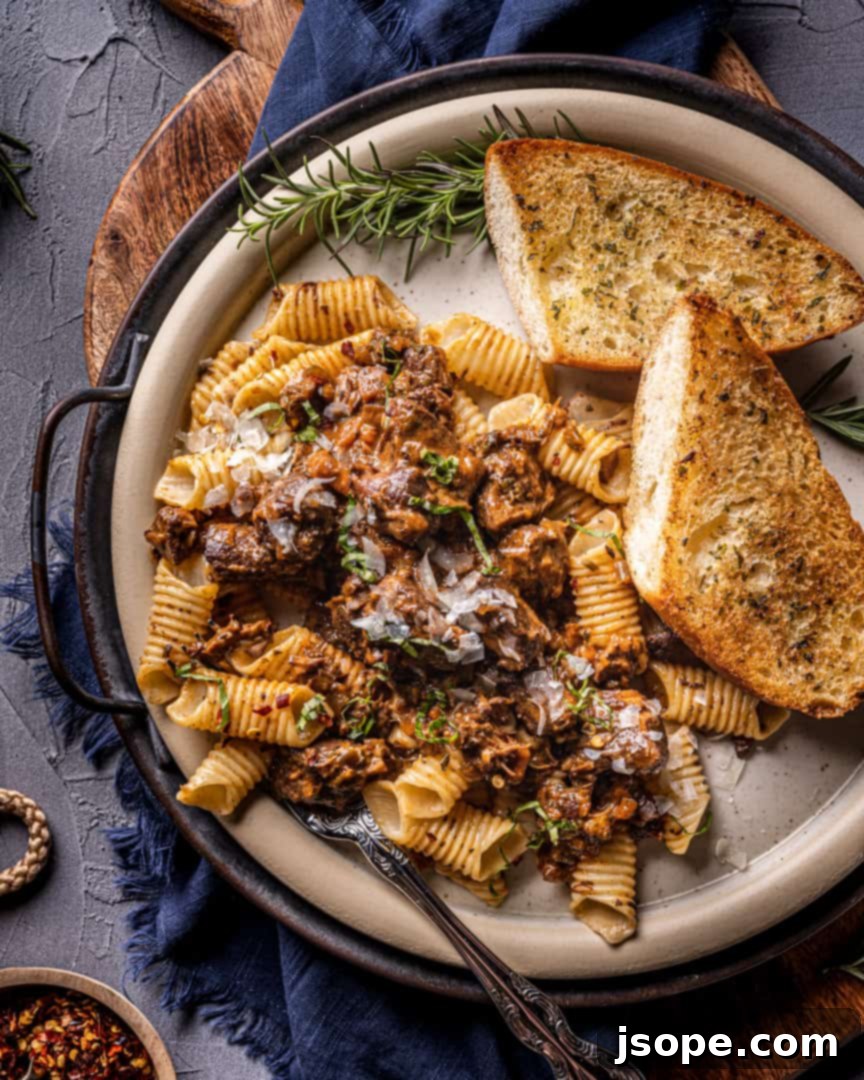 Hearty Pork and Shiitake Mushroom Ragù served over pasta