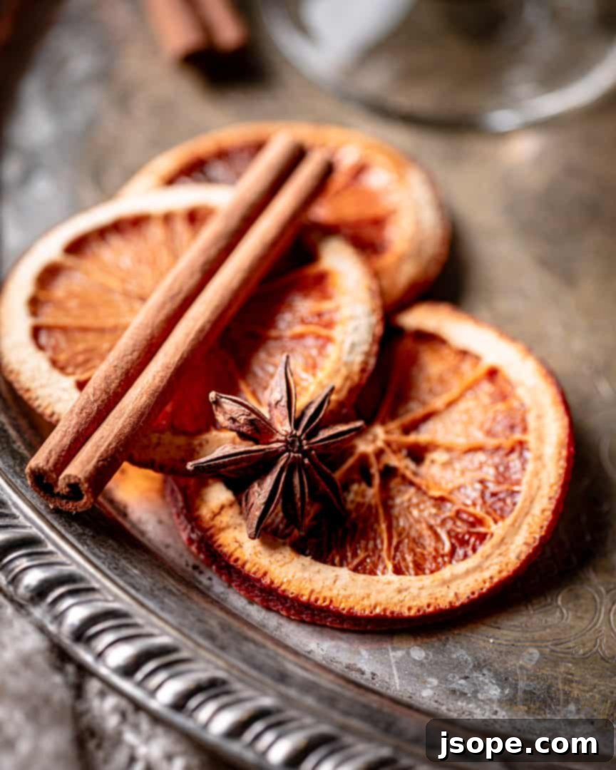 A close-up of sweet dehydrated orange slices, perfect as a garnish or snack.