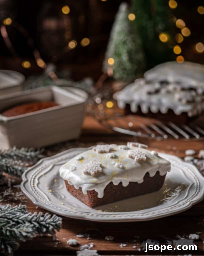 Zesty Lemon-Topped Spiced Gingerbread Loaflets 3 Close-up of a single Gingerbread Mini Loaf Cake with Lemon Glaze