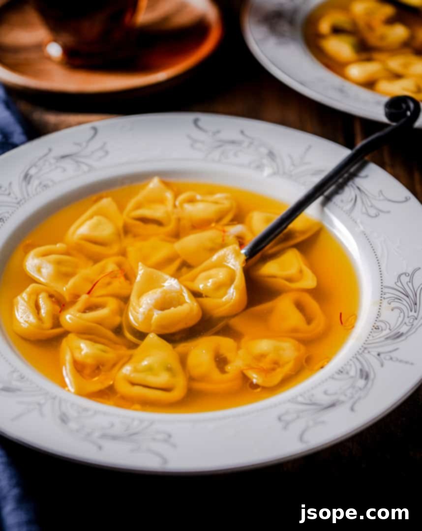 Close-up of freshly shaped Coriander Ricotta Tortellini on a floured surface
