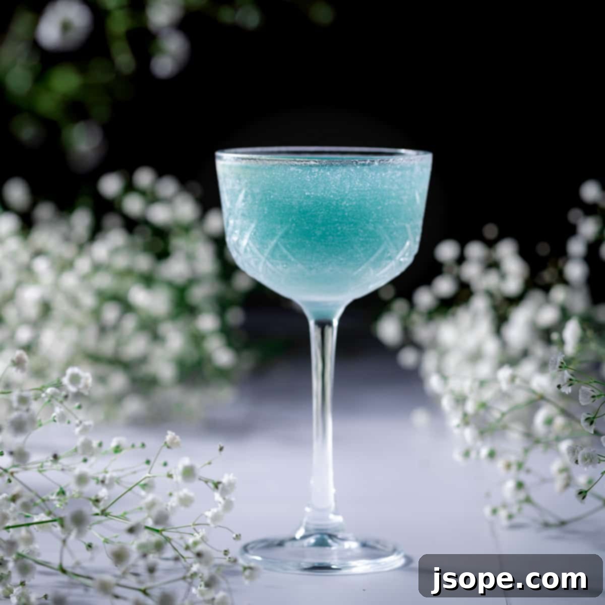 Blue Grotto Cucumber Ginger Cocktail - A stunning blue gin drink inspired by Capri's grottoes