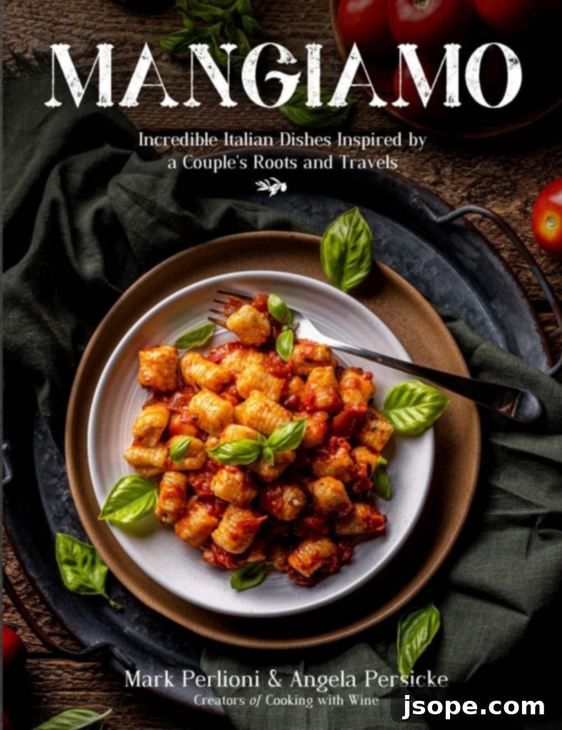 Mangiamo, the cookbook cover, featuring delicious Italian dishes.