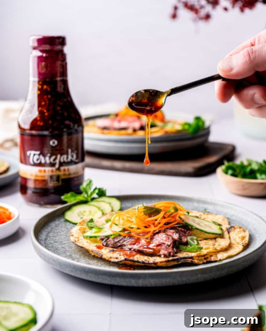 Grilled skirt steak, perfectly seared and ready to be sliced for Teriyaki Steak Tacos.