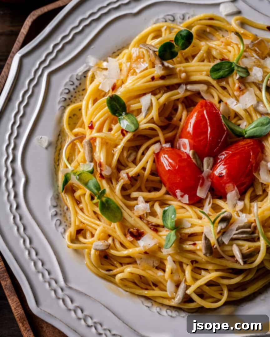 Spaghetti with Garlic Olive Oil and Chili Peppers with Sunflower Microgreens and Roasted Sunflower Seeds