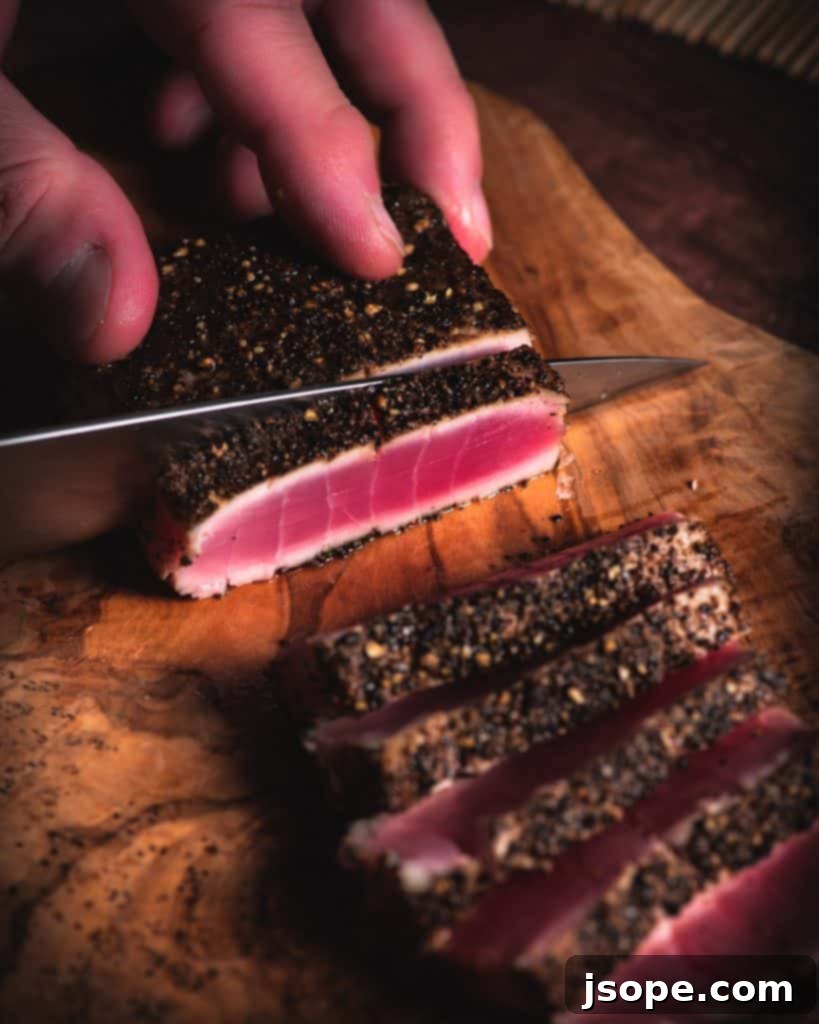 A vibrant platter of Seared Ahi Tuna and the spicy dipping sauce.