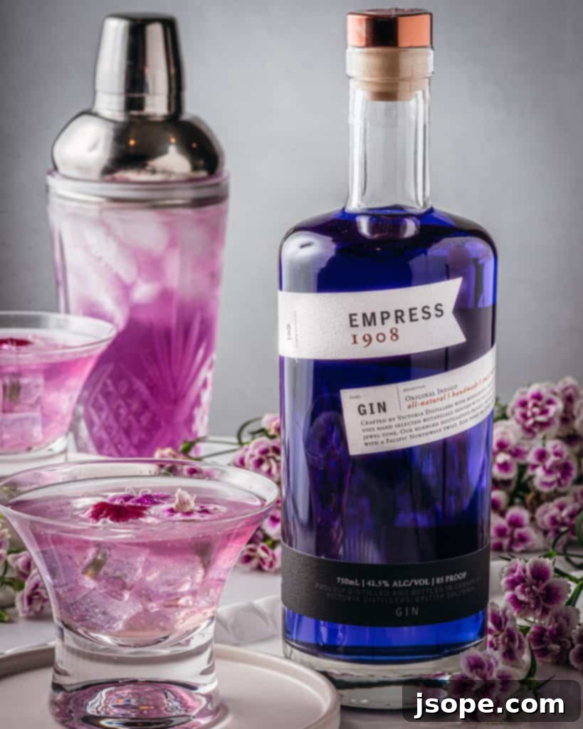 Empress Maid of Honor Gin Cocktail with a vibrant pink hue
