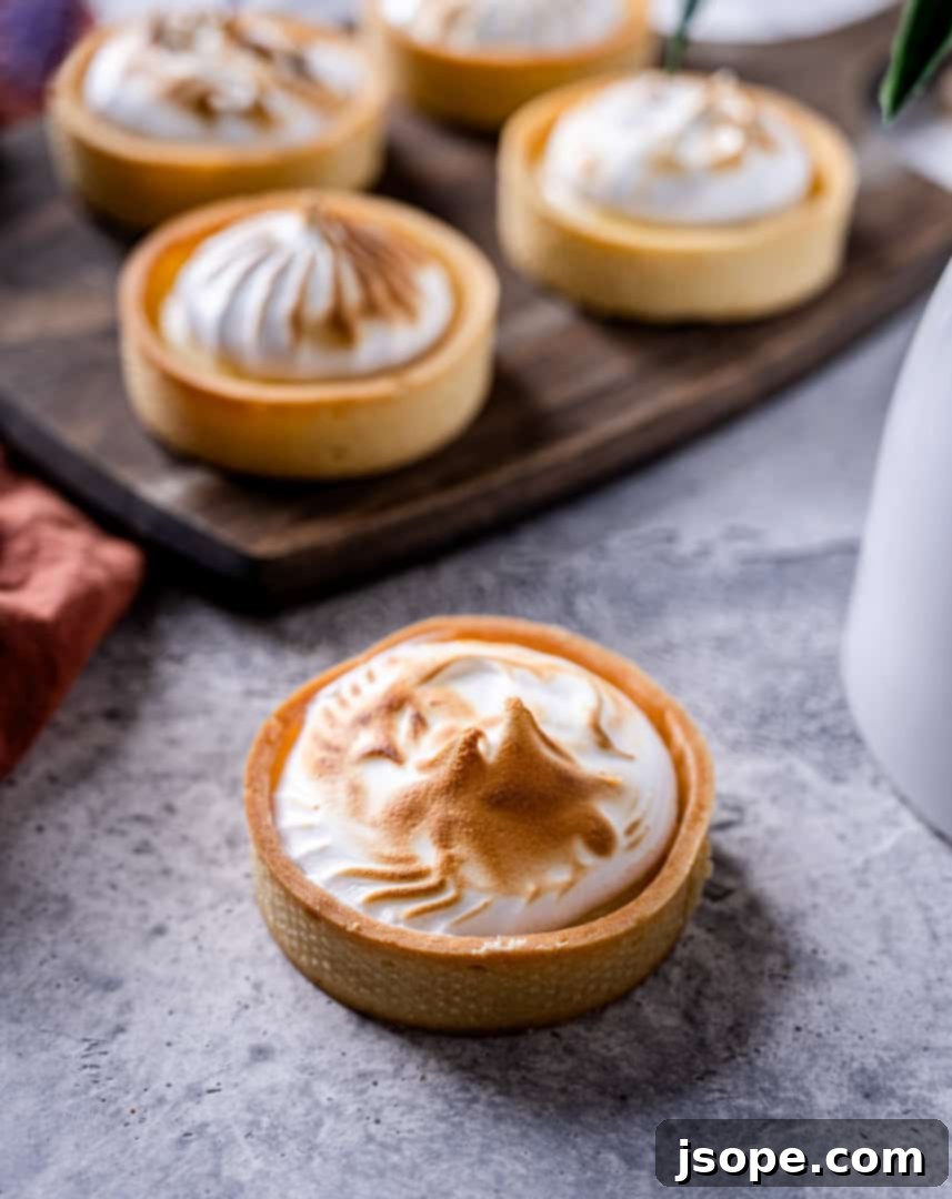 Blind-baked tart shells, ready for filling with lavender lemon curd and meringue.