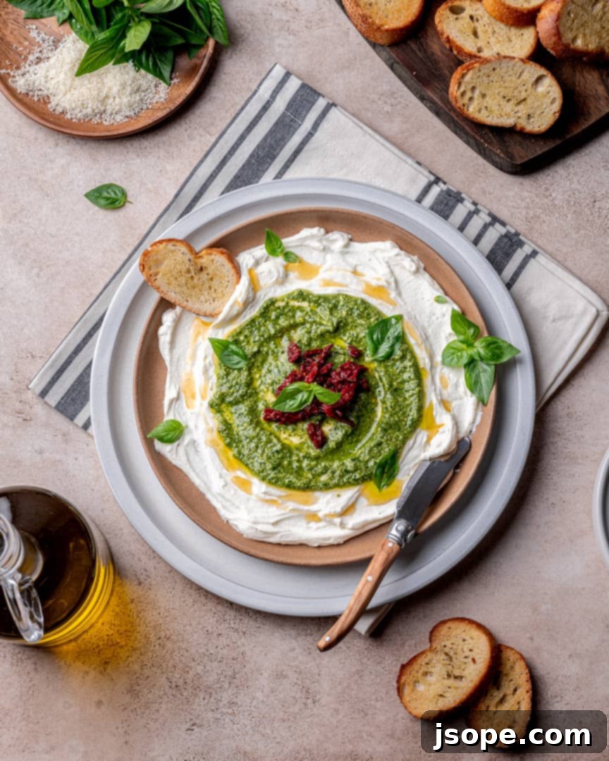 Plated Whipped Ricotta with Basil Pesto and Sun Dried Tomatoes