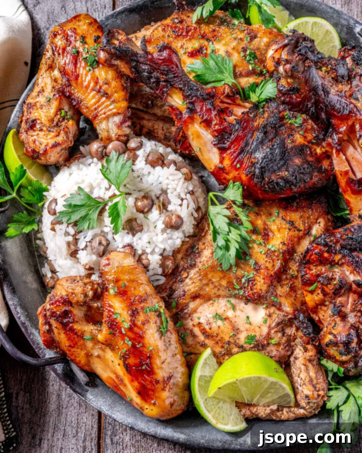 Jamaican Jerk Chicken: The Ultimate Flavor Bomb 5 Grilled Jamaican Jerk Chicken on a platter, ready to eat