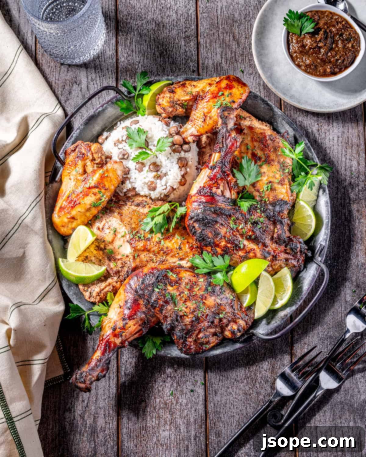 Jamaican Jerk Chicken: The Ultimate Flavor Bomb 7 Platter of Jamaican Jerk Chicken with side dishes