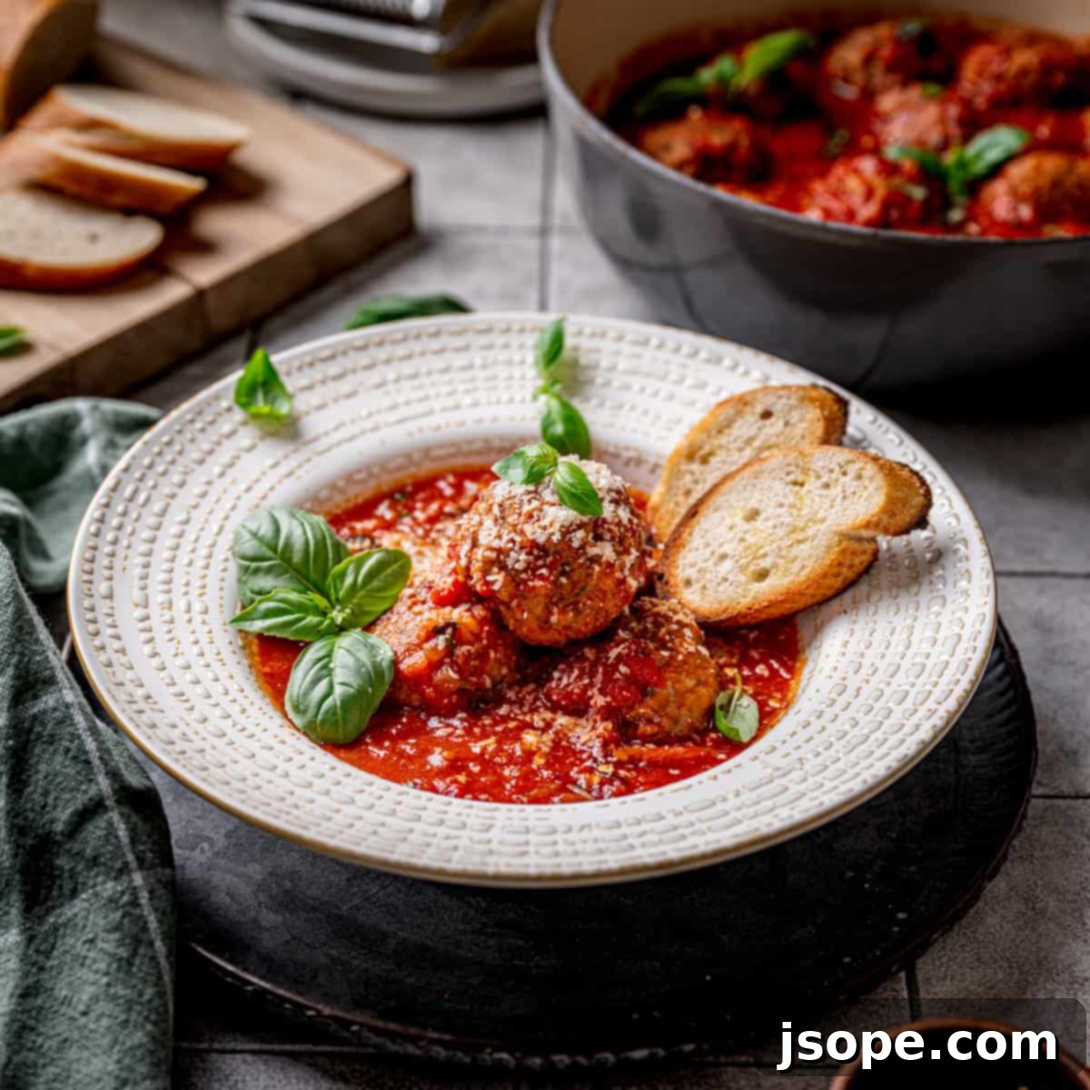 Savory Italian Meatballs Simmered in Rich Tomato Sauce 2 Classic Italian Meatballs in Tomato Sauce (Polpette al Sugo) served in a rustic bowl