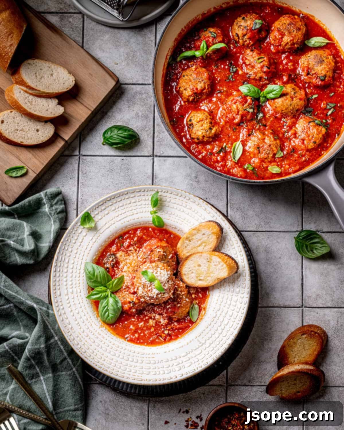 Savory Italian Meatballs Simmered in Rich Tomato Sauce 3 Close up of juicy Classic Italian Meatballs simmering in tomato sauce
