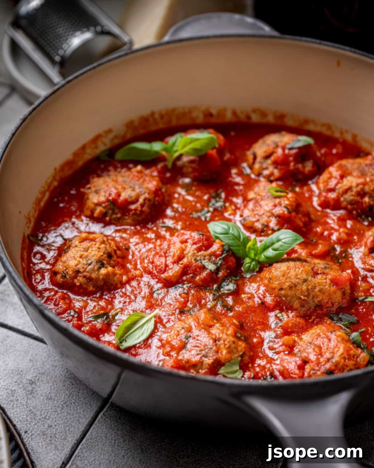 Savory Italian Meatballs Simmered in Rich Tomato Sauce 4 Preparing Classic Italian Meatballs - mixing ingredients in a bowl
