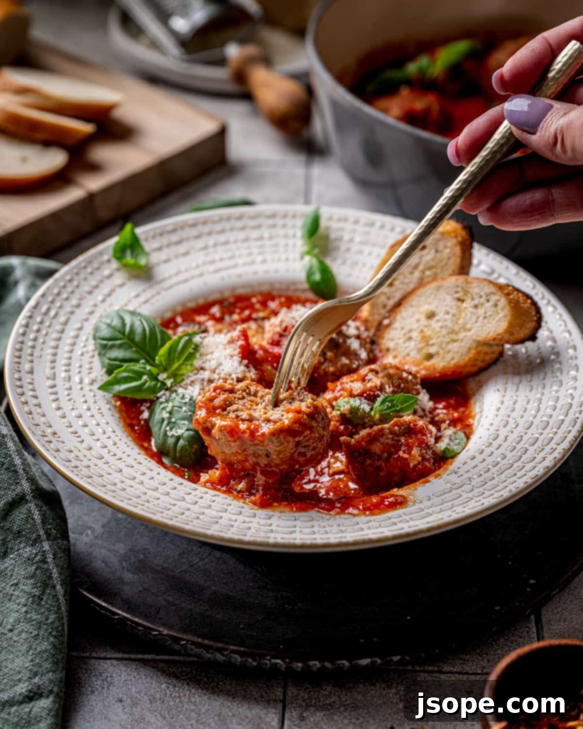 Savory Italian Meatballs Simmered in Rich Tomato Sauce 6 Classic Italian Meatballs in Tomato Sauce (Polpette al Sugo) in a serving dish